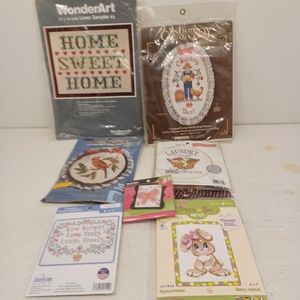 Lot of needle work kits all new never opened.